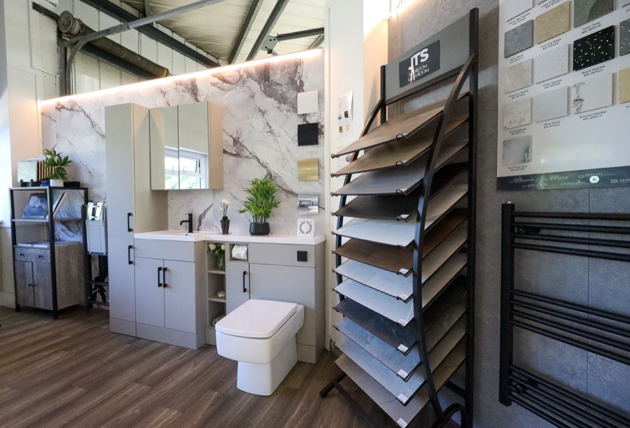 Bathroom finish and wall panel sample board inside the JTS showroom