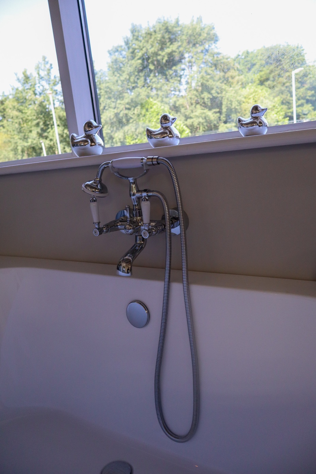 Shower enclosure and towel rail display at JTS in Middleton