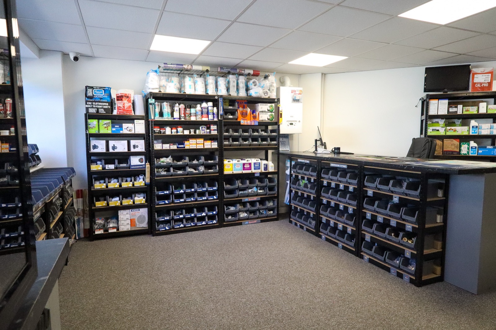 Shelving and stocked fittings inside the JTS trade counter